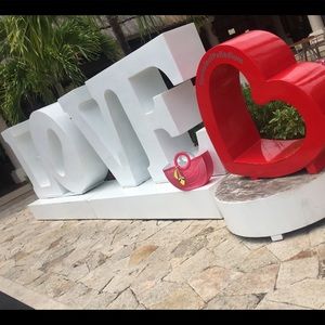 Henri Bendel Perforated Half Circle Tote